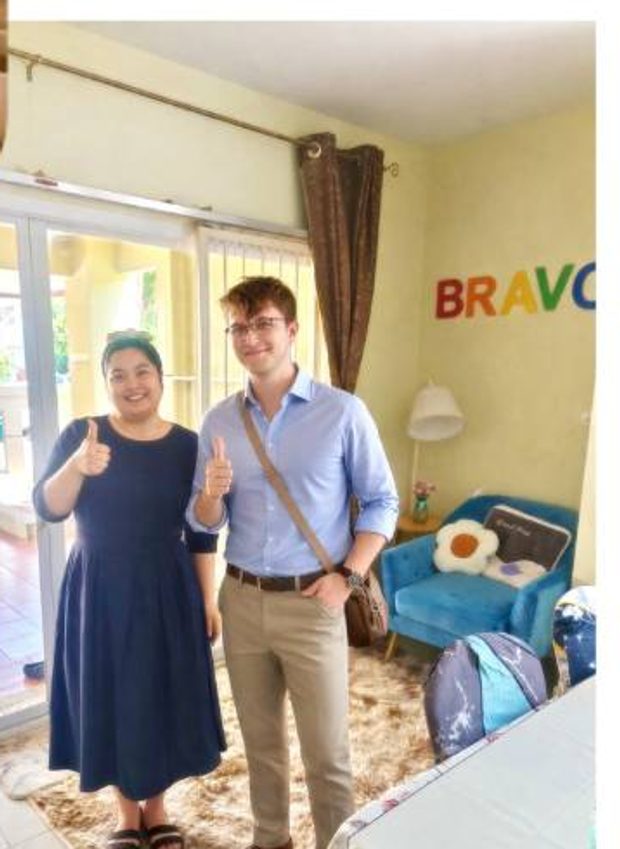 Happy clients giving a thumbs up